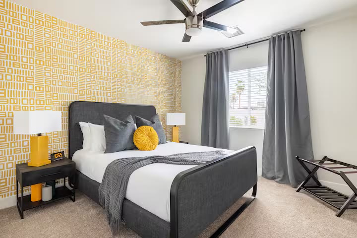 Stylish & Perfect for Families primary bedroom at a direct-booking vacation rental in Phoenix, Arizona
