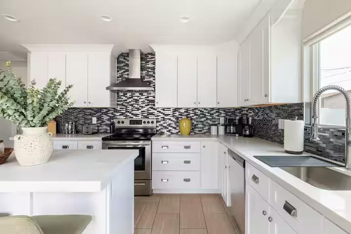 Stylish & Perfect for Families open kitchen at a direct-booking vacation rental in Phoenix, Arizona