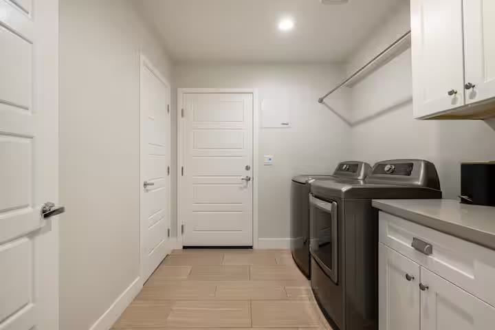Stylish & Perfect for Families laundry room at a direct-booking vacation rental in Phoenix, Arizona