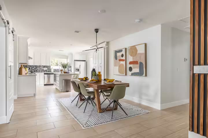 Stylish & Perfect for Families open living and dining room at a direct-booking vacation rental in Phoenix, Arizona