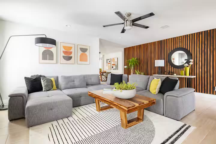 Stylish & Perfect for Families living room sofa at a direct-booking vacation rental in Phoenix, Arizona