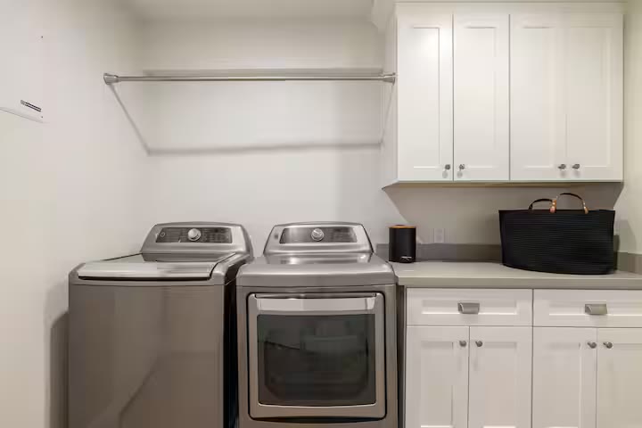 Stylish & Perfect for Families laundry room at a direct-booking vacation rental in Phoenix, Arizona