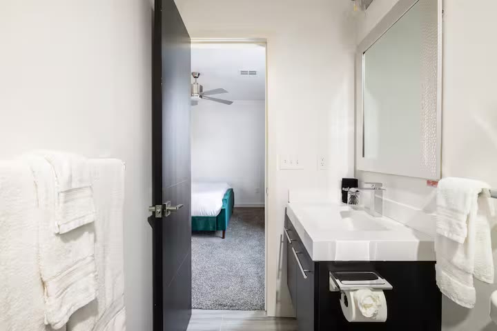 Modern All-En-Suite Home en-suite bathroom at a direct-booking vacation rental in Phoenix, Arizona
