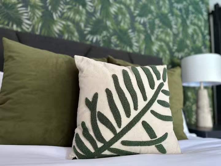 Palm Haven Pool House bedroom detail at a direct-booking vacation rental in Phoenix, Arizona