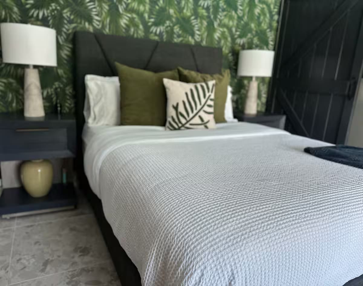 Palm Haven Pool House bedroom at a direct-booking vacation rental in Phoenix, Arizona
