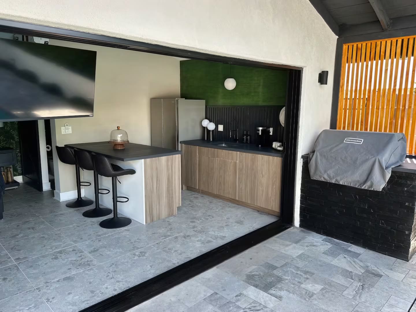 Palm Haven Pool House kitchenette with pool view at a direct-booking vacation rental in Phoenix, Arizona