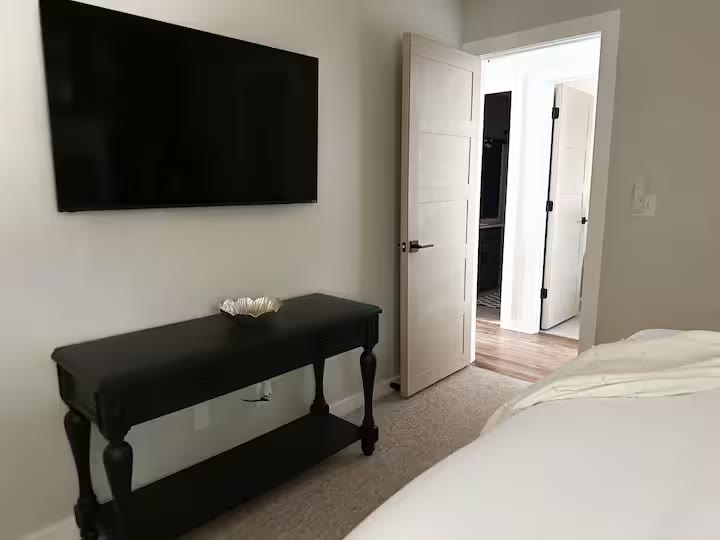 The Angler's Canoe Lake House bedroom storage at a direct-booking vacation rental in Cedar Bluff, Alabama
