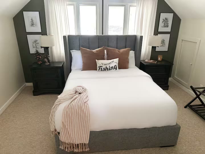 The Angler's Canoe Lake House guest bedroom at a direct-booking vacation rental in Cedar Bluff, Alabama