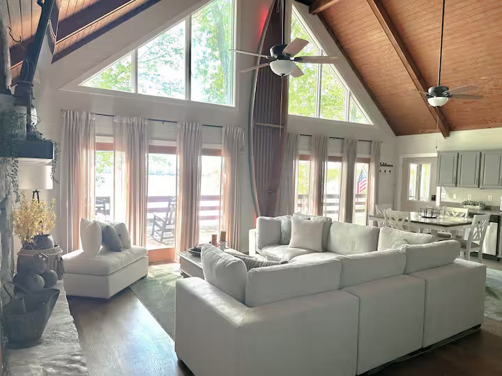The Angler's Canoe Lake House living room seating at a direct-booking vacation rental in Cedar Bluff, Alabama