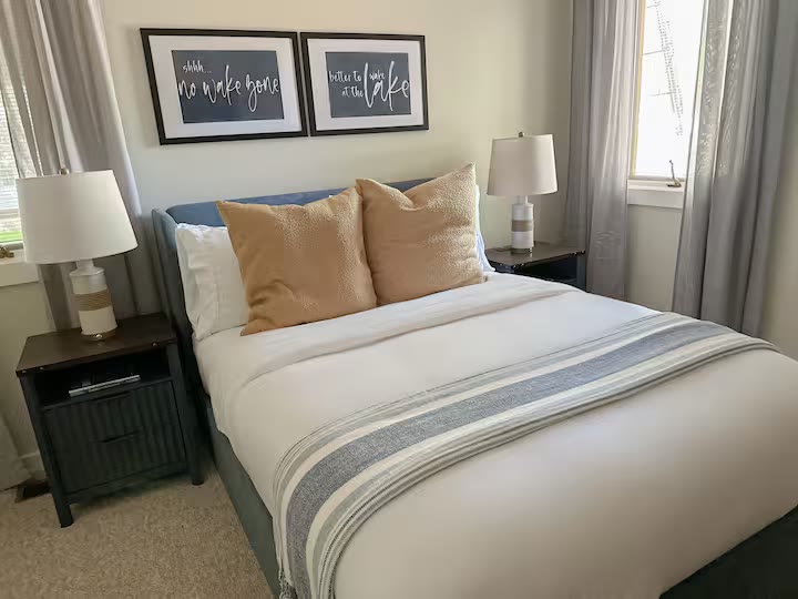 The Angler's Canoe Lake House bunk bedroom at a direct-booking vacation rental in Cedar Bluff, Alabama