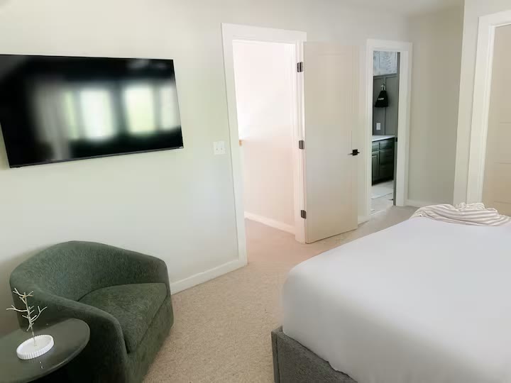 The Angler's Canoe Lake House guest bedroom at a direct-booking vacation rental in Cedar Bluff, Alabama