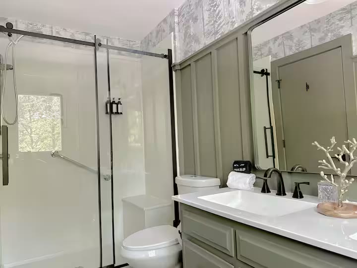 The Angler's Canoe Lake House bathroom vanity at a direct-booking vacation rental in Cedar Bluff, Alabama