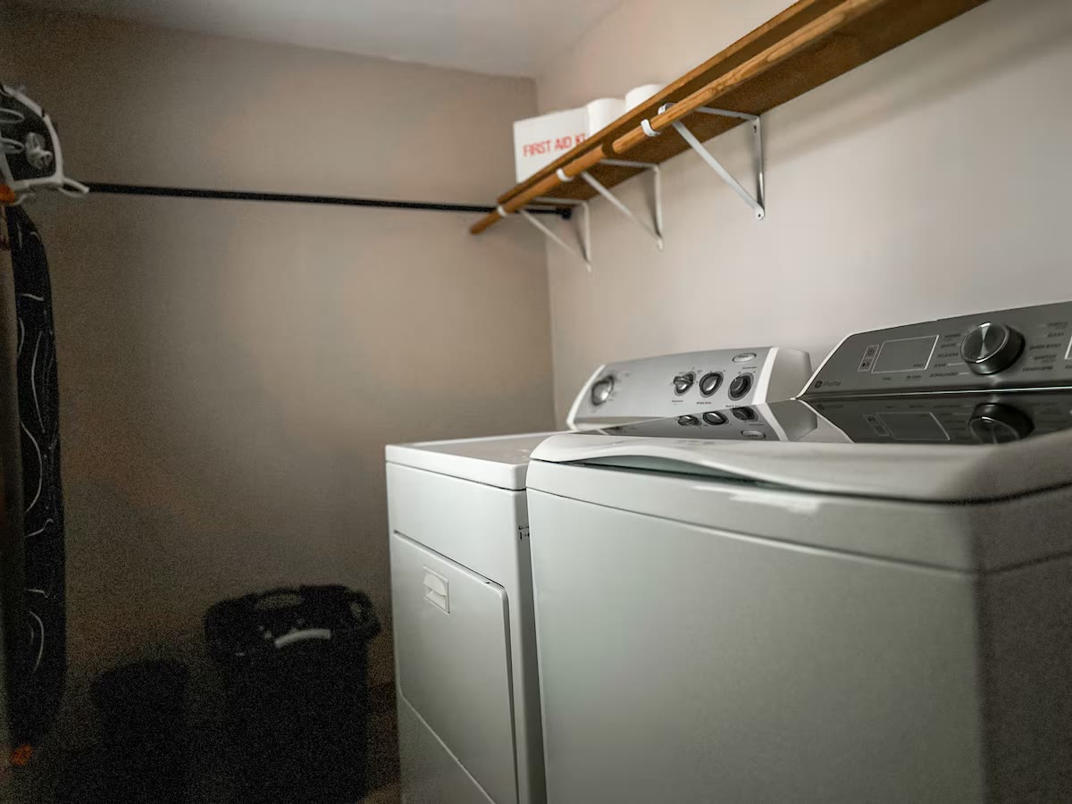 The Angler's Canoe Lake House laundry room at a direct-booking vacation rental in Cedar Bluff, Alabama