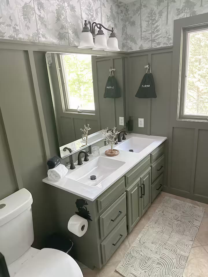 The Angler's Canoe Lake House bathroom vanity at a direct-booking vacation rental in Cedar Bluff, Alabama