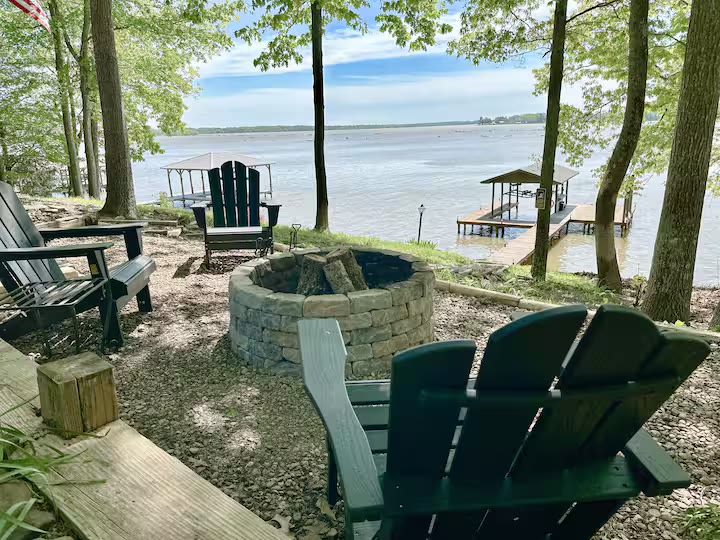 The Angler's Canoe Lake House lake view dock at a direct-booking vacation rental in Cedar Bluff, Alabama