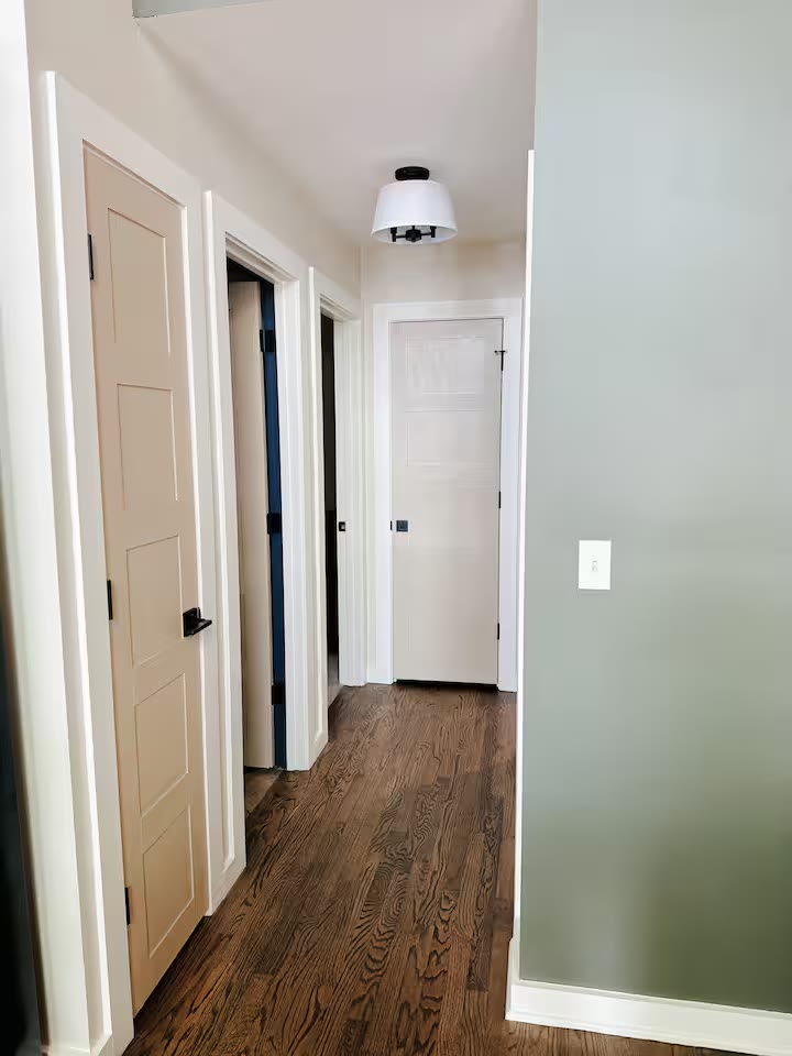 The Angler's Canoe Lake House hallway at a direct-booking vacation rental in Cedar Bluff, Alabama